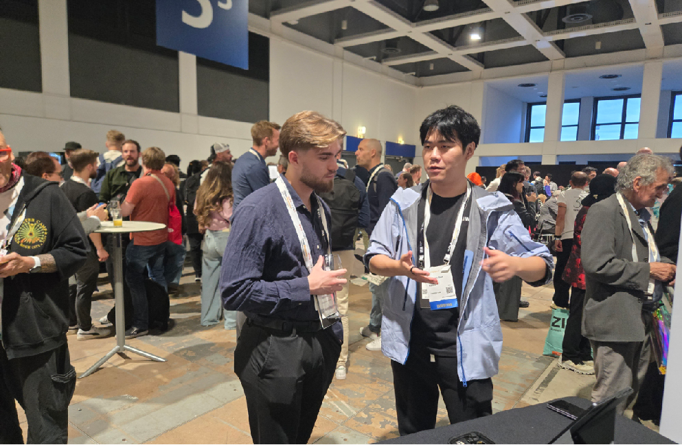 Attendees at the KiWear booth