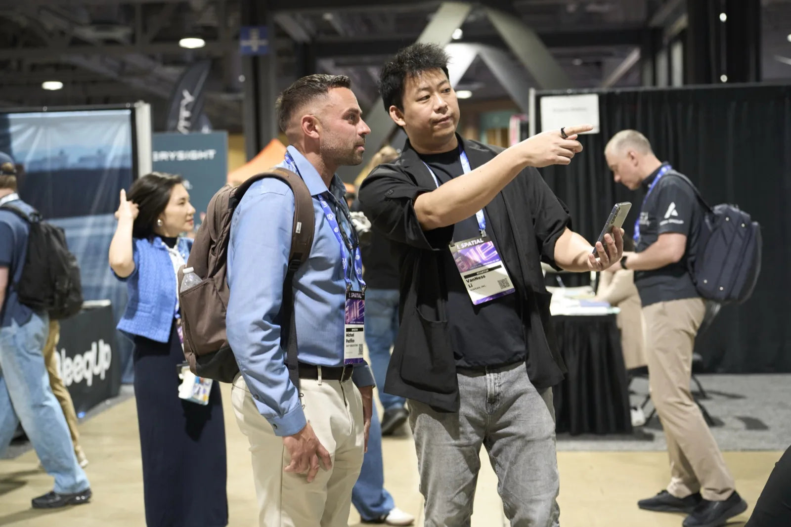 Attendees at the KiWear booth