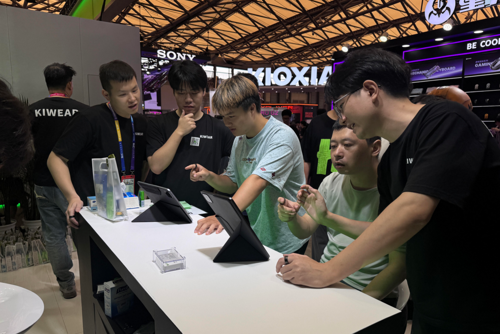 Talking visitors through the Ring Controller at the booth