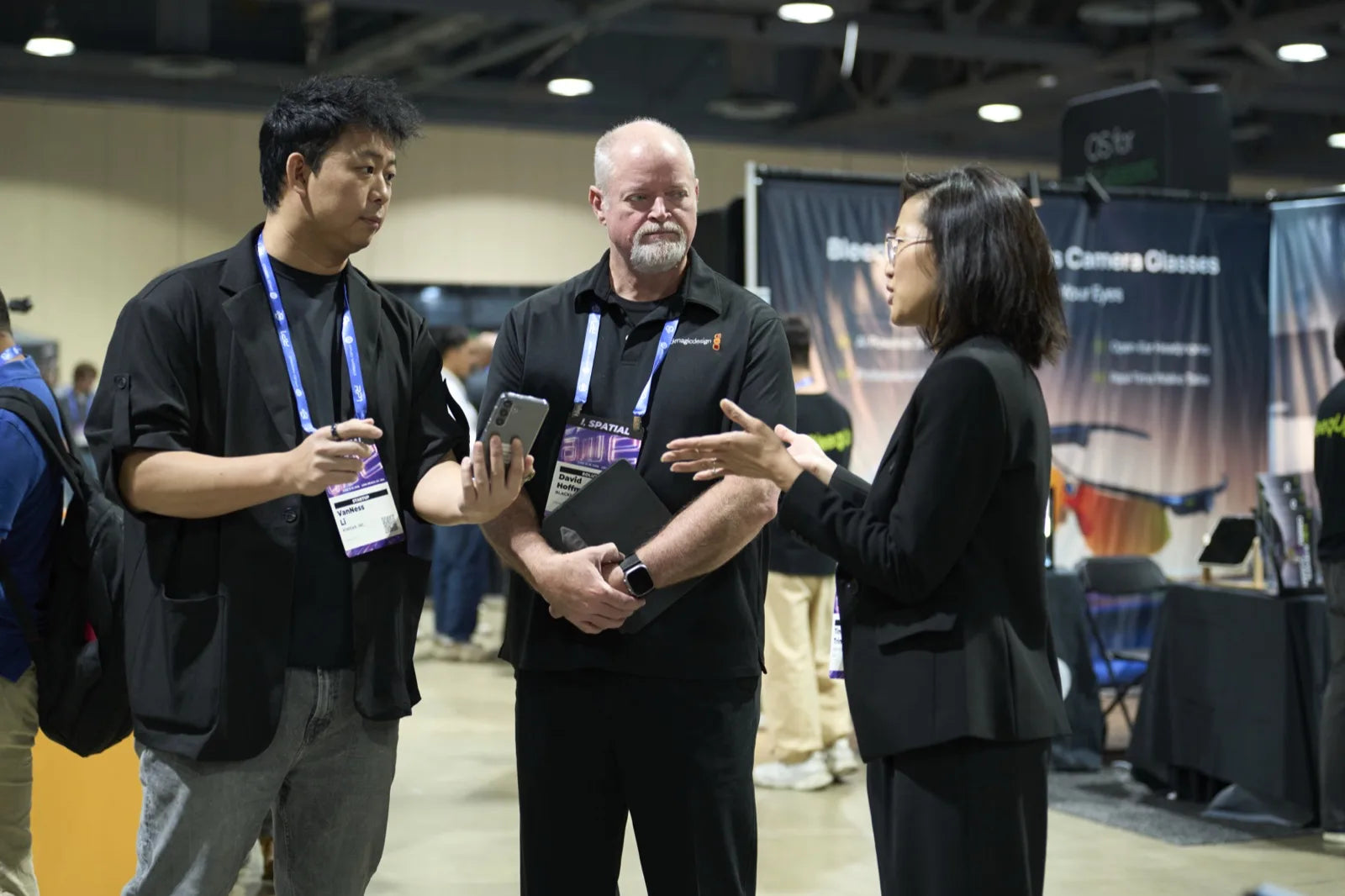 Talking visitors through the Ring Controller at the booth